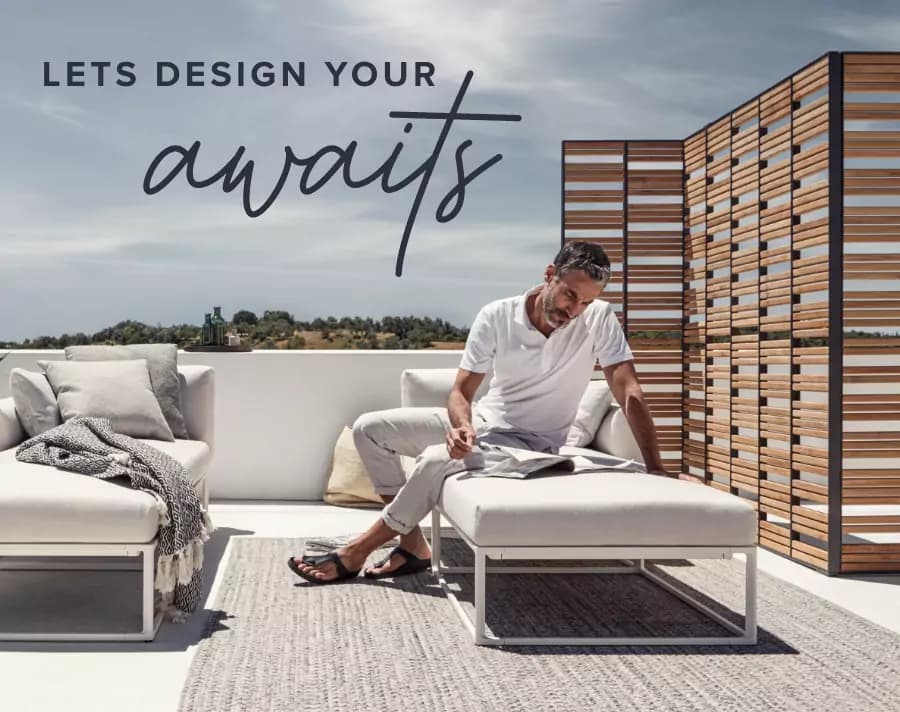 Contemporary outdoor lounge setting featuring two cushioned chaise lounges, a modern side table, and a large agave planter on a sunlit terrace. A man relaxes while reading beside a decorative wood privacy screen, with the headline “Your Oasis Awaits” displayed above the scene.