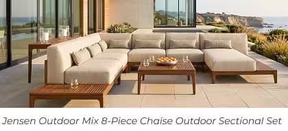 Large modular sectional with chaise, teak tables, and fruit bowl on a contemporary oceanfront patio.